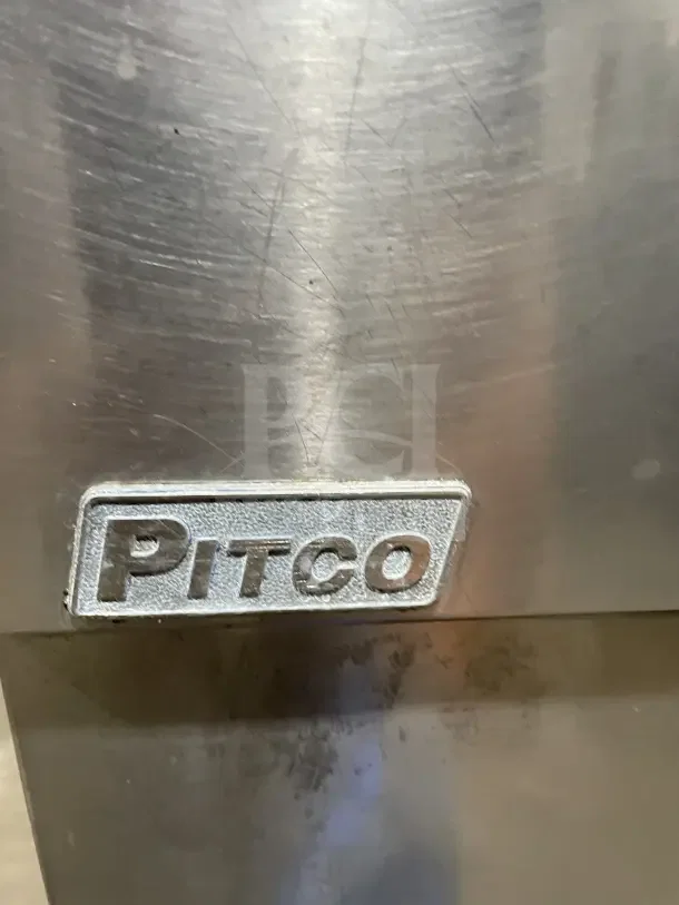 Pitco stainless steel deep fat fryer, Model SFSG14 JS, with backsplash, basket hanger, and fry basket, on legs.
