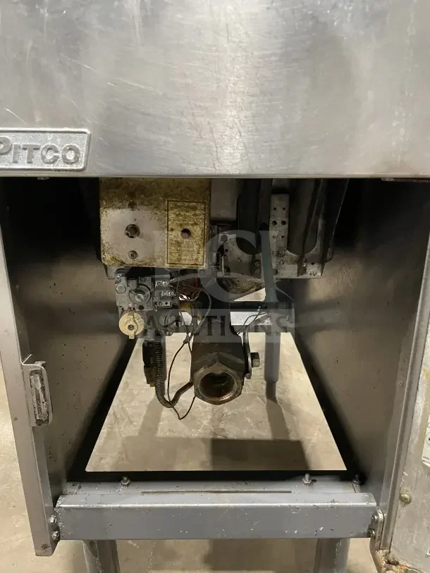 Pitco SFSG14 JS 40 lb. deep fryer, natural gas, stainless steel, includes backsplash, basket hanger, and fry basket, on legs.