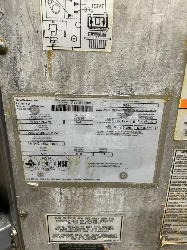 Pitco commercial stainless steel natural gas fryer, model SFSG14. Includes backsplash, basket hanger, fry basket; serial G11MD058018.