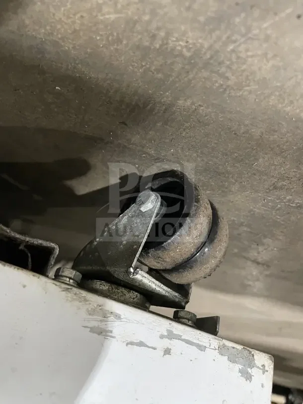 Galaxy commercial refrigerator caster wheel; part of model 177GRI20RW. Shows rust and wear.