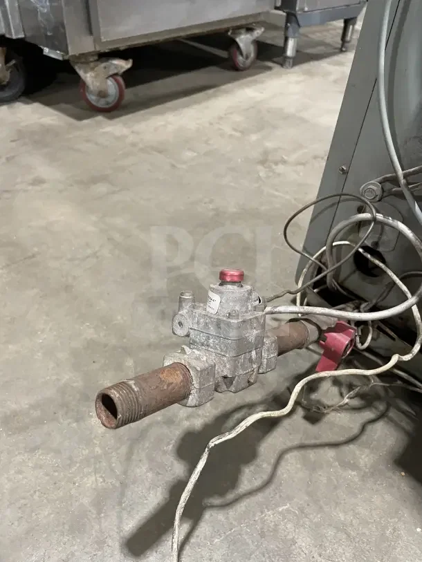 Modine PA Series stainless steel gas-fired space heater, showing gas connection and wiring. Appears used, fair condition.