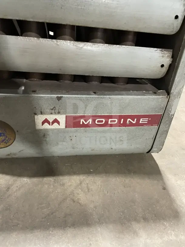 Modine PA Series stainless steel gas-fired industrial space heater, features visible wear, brand label shown.