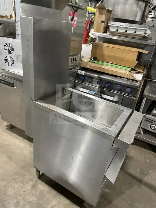 Commercial stainless steel Solstice Supreme pasta cooker with backsplash and legs; features durable construction and spacious basin.