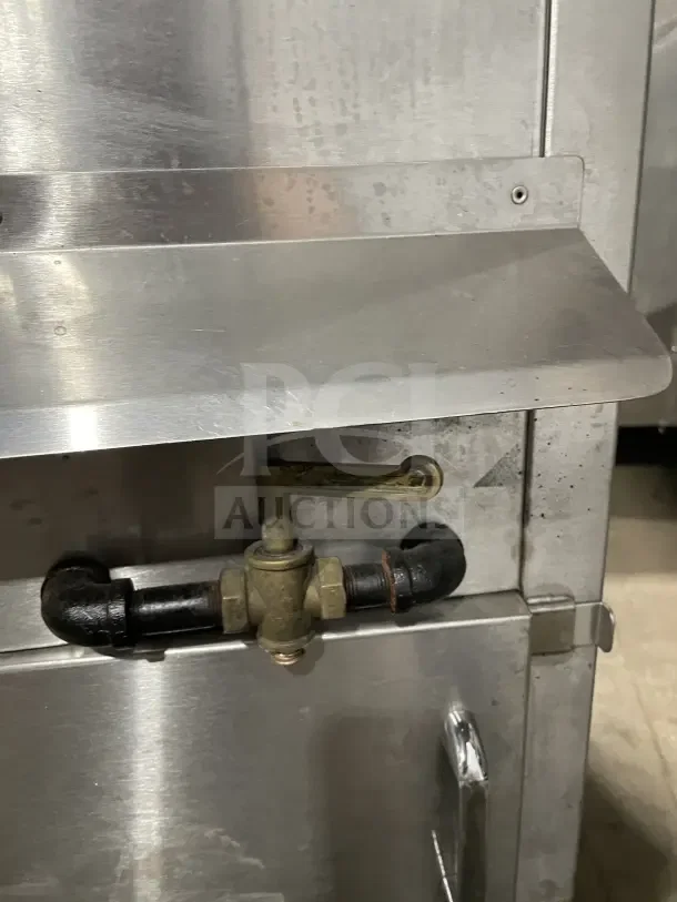 Commercial stainless steel Solstice Supreme pasta cooker in good condition, features a backsplash and sturdy legs.