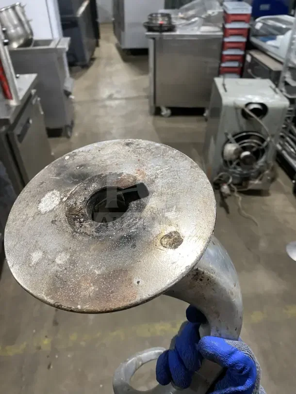 Commercial stainless steel spiral dough hook for 60Qt planetary mixers, used condition with wear and oxidation marks.