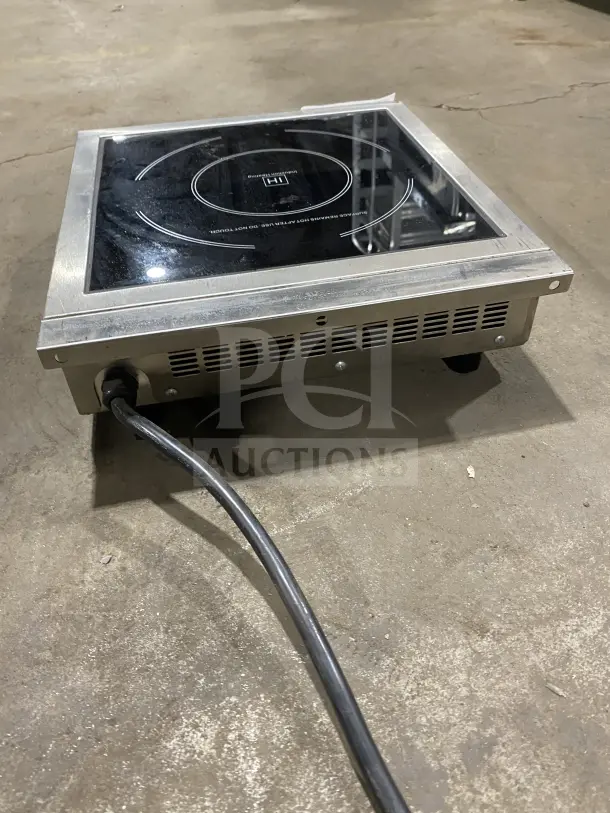 Avantco IC3500 commercial stainless steel countertop induction range, 208-240V, visible cord, good condition.