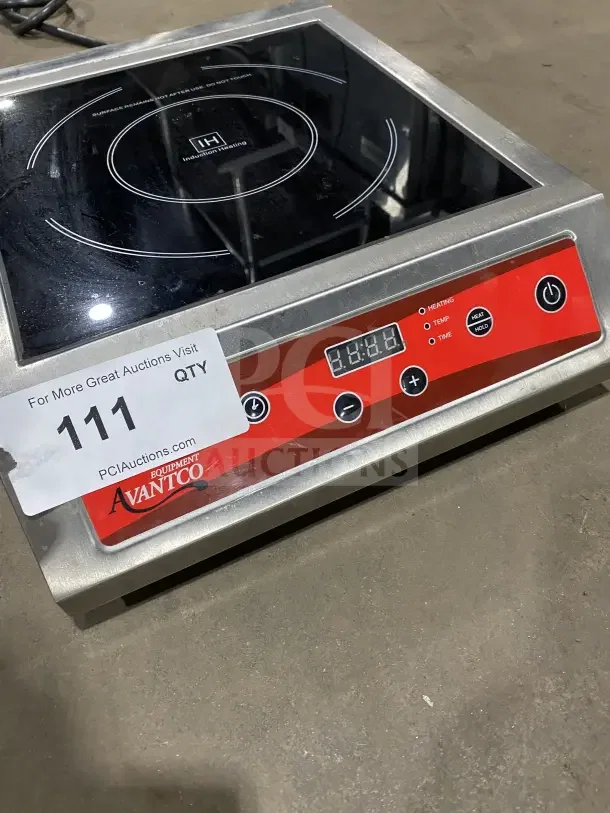 Avantco IC3500 stainless steel induction range, 208-240V, with digital controls. Excellent condition, model label visible.