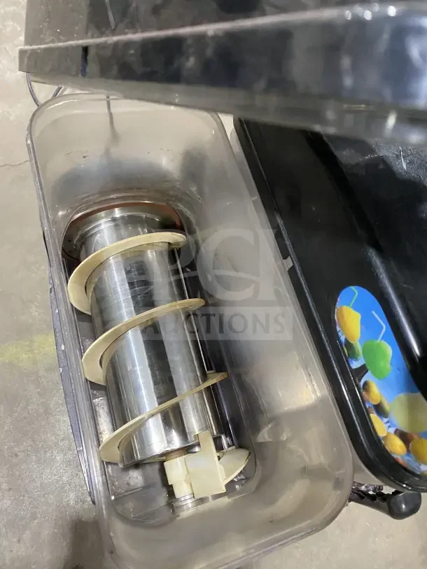 Omega OFS20 commercial countertop slushie dispenser, 2-flavor model. Stainless steel interior, clear container, used condition.