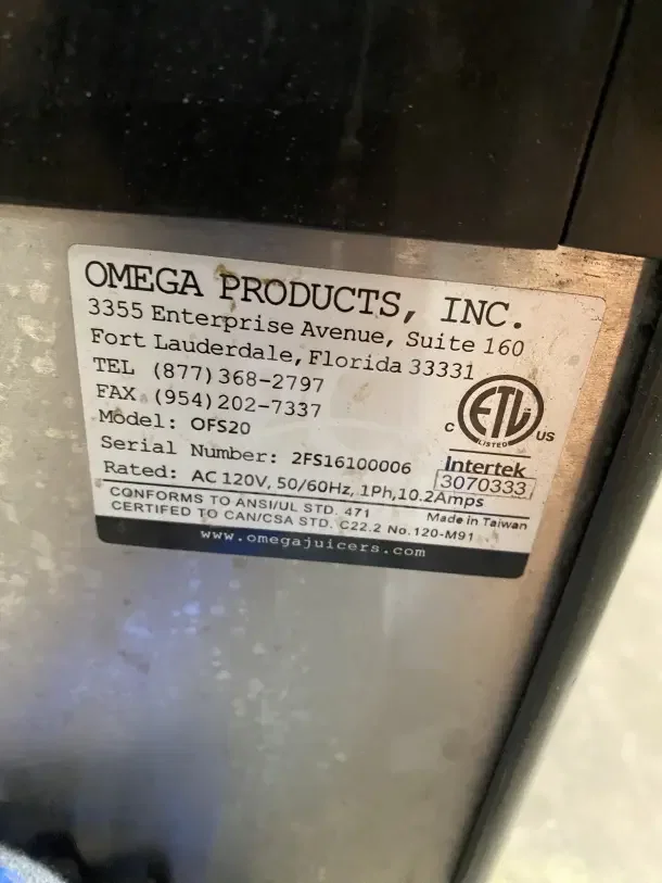 Omega OFS20 slushie dispenser label with serial number 2FS16100006, rated AC 120V, 50/60Hz, 10.2 Amps. Made in Taiwan.