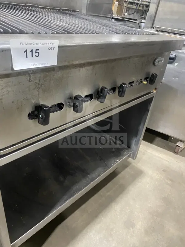 Jade Bistro stainless steel gas charbroiler with open cabinet base, on casters, model 115, used condition.