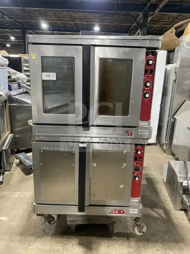 Blodgett double-stacked stainless steel convection oven, electric powered, with wired rack and caster legs. Good condition.