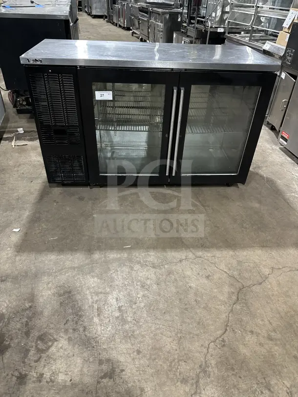 Perlick BBS60 commercial stainless steel 2-door bar cooler with chrome wire rack, glass doors, and casters. Model SN: 713287.