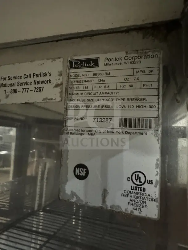 Perlick BBS60-RM stainless steel bar back cooler, 2 glass doors, chrome wire rack, on casters, 115V, good condition, SN: 713287.