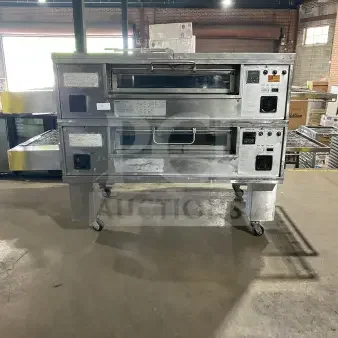 Middleby Marshall PS570S stainless steel double deck conveyor pizza oven, natural gas, model PS570S, on casters.
