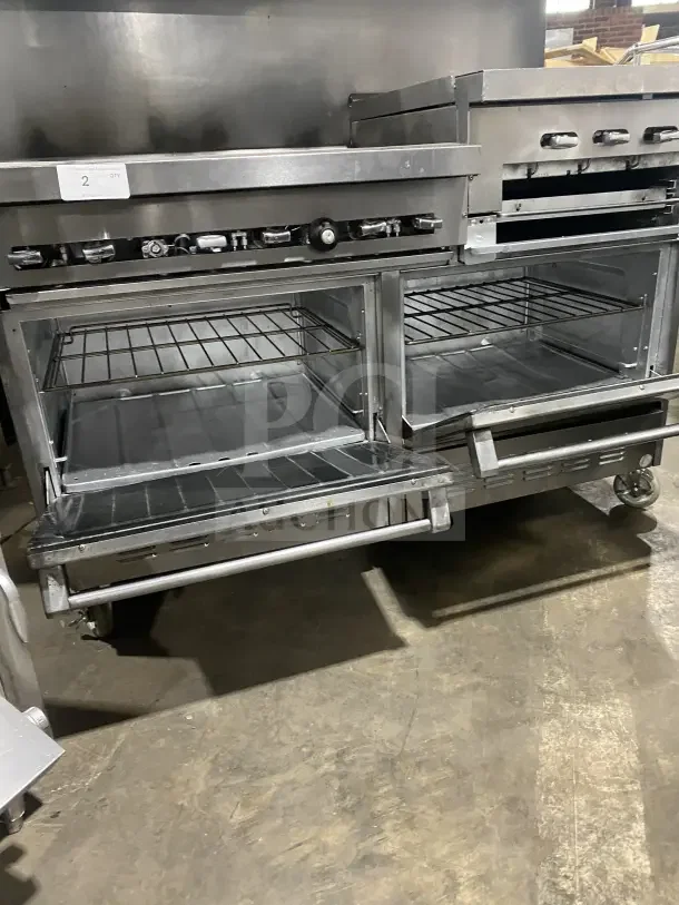 Sunfire commercial stainless steel gas range with 6 burners, side griddle, 2 ovens, wire racks, and casters.