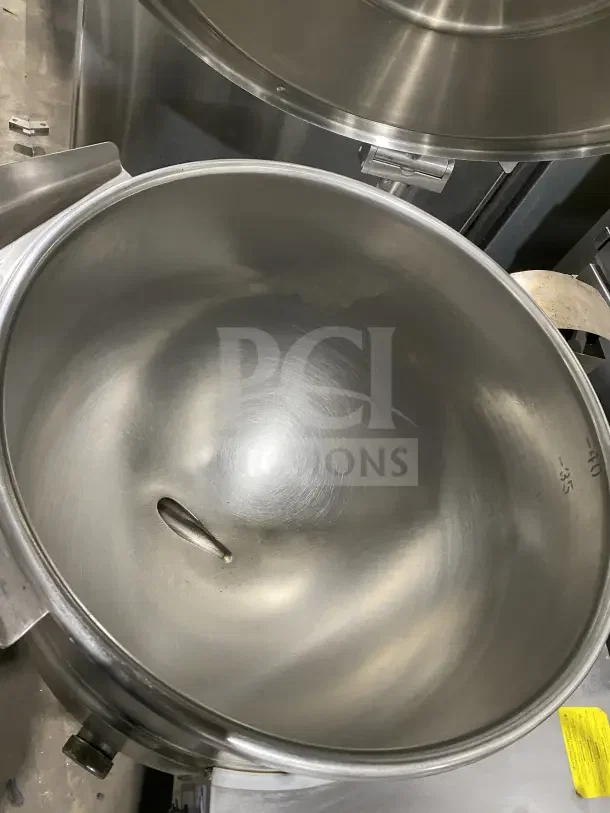 Cleveland Range Enodis KGL-40-T 40 Gal. stainless steel tilting steam kettle, with swivel spout faucet, on legs, in good condition.