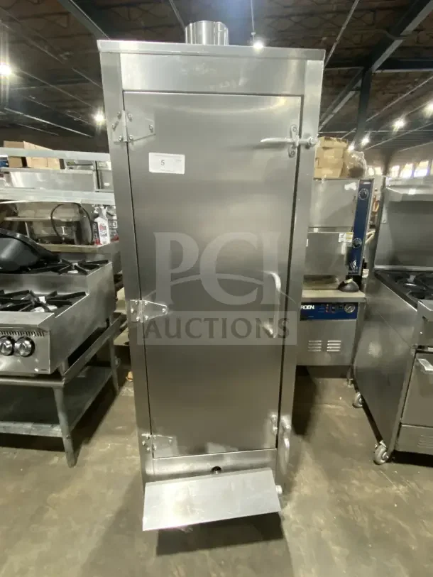 Commercial stainless steel vertical gas smoker oven on casters, excellent condition, sturdy handle and hinges, numbered label.
