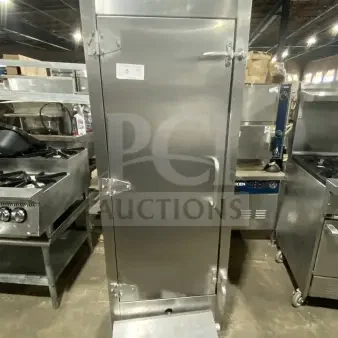 Commercial stainless steel vertical gas smoker oven on casters, excellent condition, sturdy handle and hinges, numbered label.