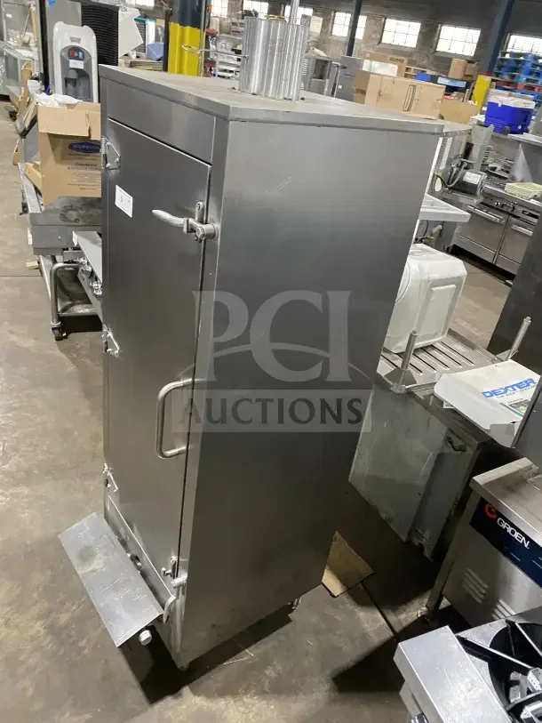 Commercial stainless steel vertical gas-powered smokehouse oven on casters, features sturdy handles and vented top.