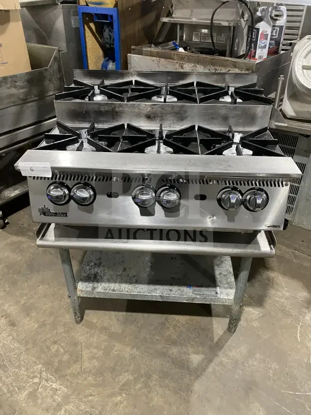 UltraMax 806HA stainless steel 6-burner gas hot plate on a stand, excellent condition, durable for commercial use.