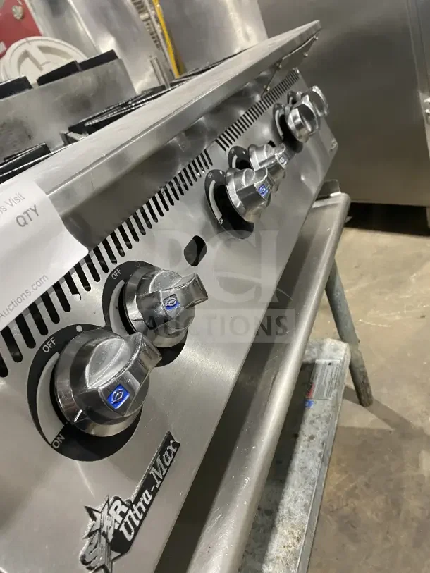 UltraMax 806HA 36" stainless steel gas hot plate with 6 burners and control knobs, comes with stainless steel stand.