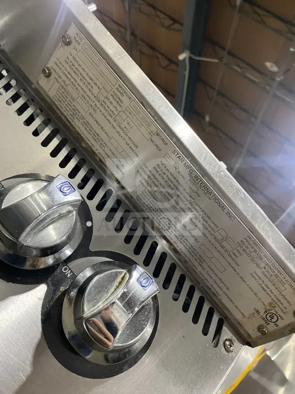UltraMax 806HA 36" stainless steel gas-powered 6-burner countertop hot plate, featuring control knobs and manufacturer label.