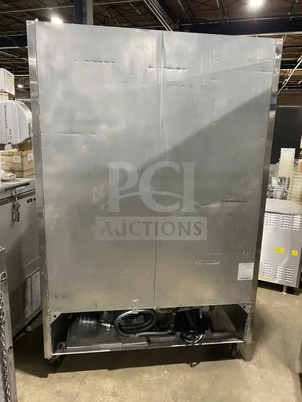 Atosa B Series commercial refrigerator, model MCF8707, stainless steel, double-glass swing doors, on casters, rear view.
