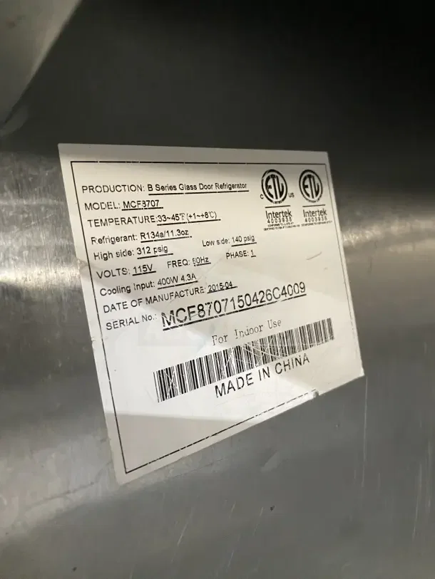 Atosa B Series MCF8707 commercial glass door refrigerator label, showing model, specs, and serial number.