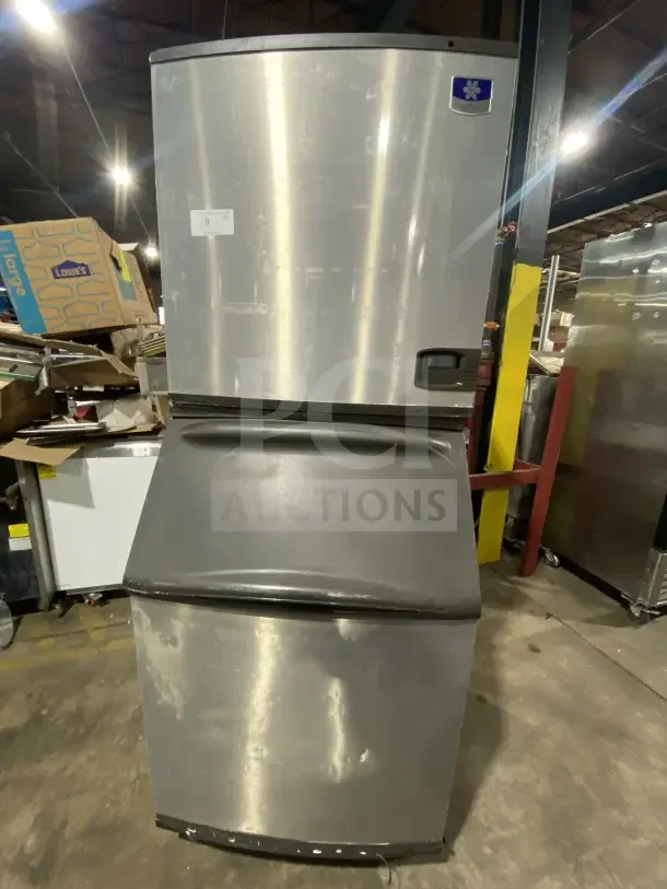Manitowoc IY1106A261 stainless steel ice machine/bin combo on legs. Electric, air-cooled, 208-230V, used condition.