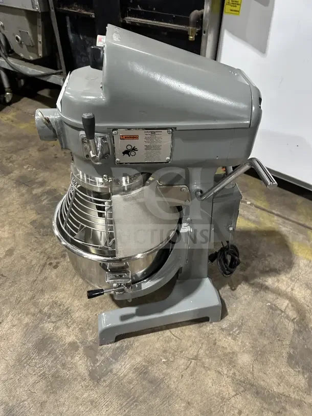 Globe Commercial Countertop Heavy-Duty Planetary Mixer with stainless steel bowl and guard, in excellent condition.
