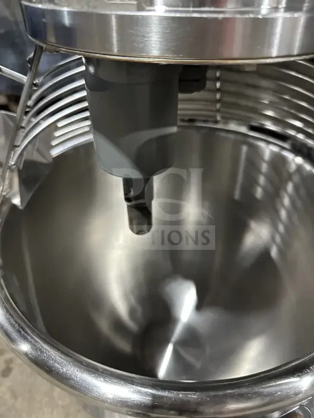 Globe commercial countertop heavy-duty planetary mixer with stainless steel bowl and guard, shown in excellent condition.