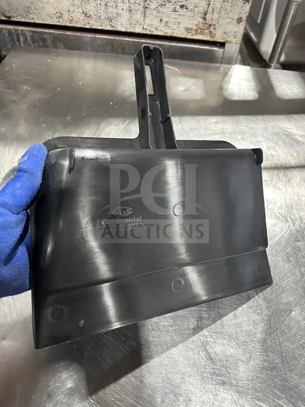 Heavy-duty black plastic ice scoop by Continetal on a stainless steel surface. New condition with visible logo marking.
