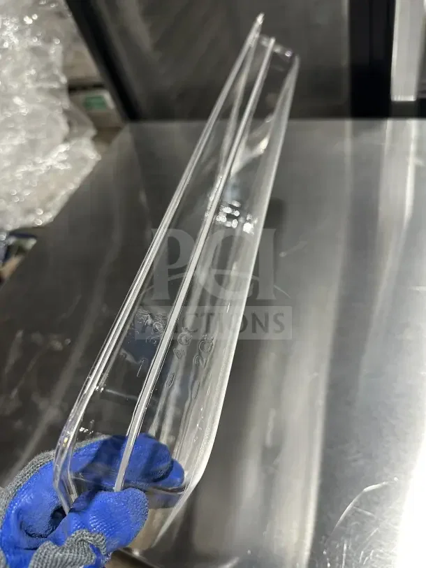 Brand new Thunder Group PLPA8002 clear polycarbonate food pan, full size, 2.5" deep, with capacity markings.