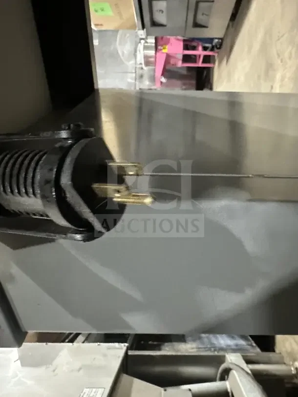 Beseler TD1610 shrink wrap system power cord plug. 220V, 1 Phase, on casters for mobility. Model SN: 061300154.