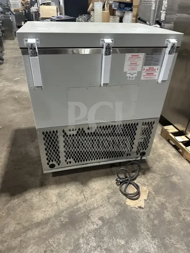 So-Low C85-5 ultra-low temperature chest freezer, 115V, good condition, warning labels visible, power cord included.