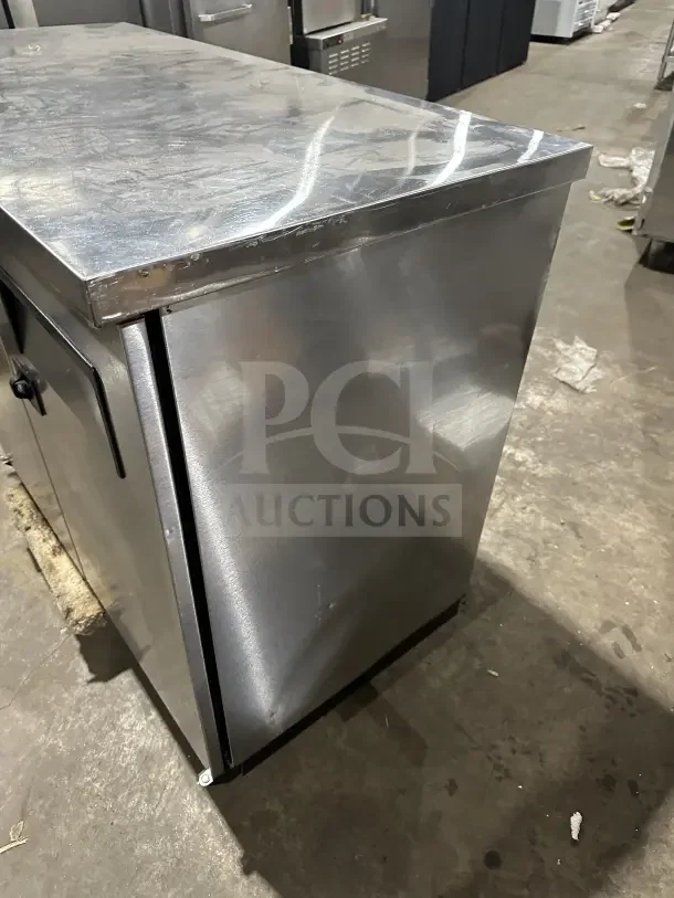 True commercial stainless steel 2-door back bar cooler, model TBB-24-48S. Features black coated wired rack, 115V.