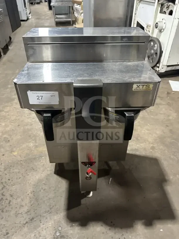 Fetco CBS-2142-XST stainless steel twin coffee brewer, electric, countertop model on legs, with visible labels and controls.
