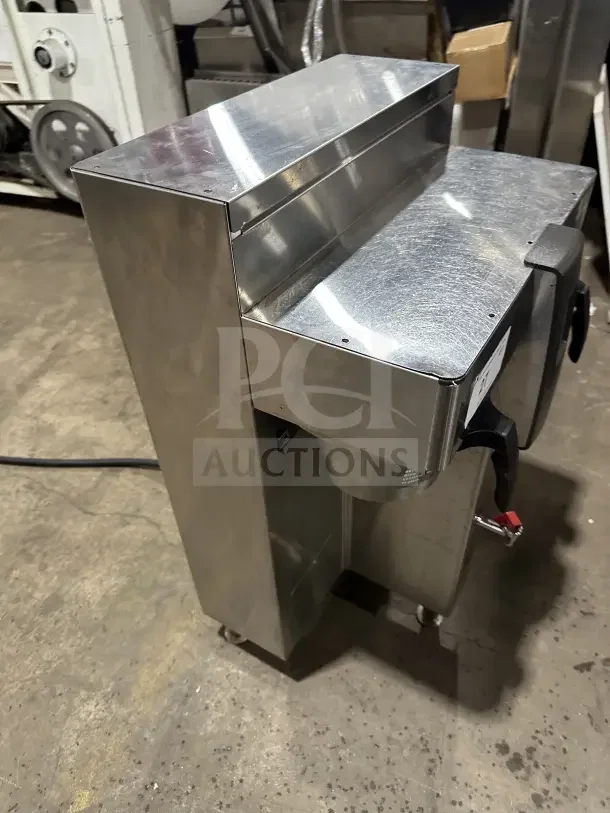 Fetco CBS-2142-XST twin coffee brewer, stainless steel, electric, 200/240V, 1 Phase, on legs, good condition.