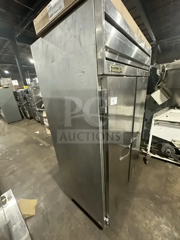 Beverage-Air E-Series stainless steel 2-door commercial fridge, model ER48-1AS, with poly coated racks, on legs, used condition.