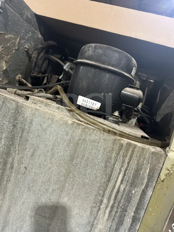 Beverage-Air ER481AS stainless steel 2-door refrigerator compressor area, model and serial number 4431161 visible, in used condition.