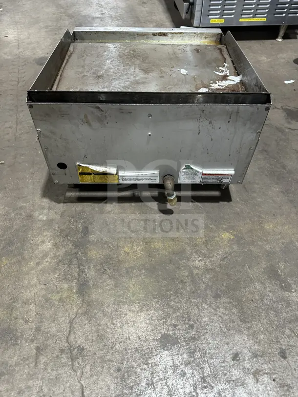Vulcan VCRG24-T1 24" Natural Gas Countertop Griddle, stainless steel, on legs, used condition with visible wear and labels.