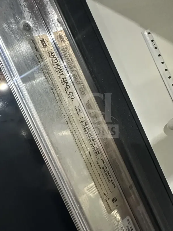 Commercial stainless steel glass 3-door sliding reach-in refrigerator with poly coated wire rack, NSF certified by Anthony Mfg Co.
