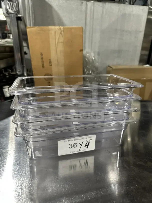 Winco SP7304 clear polycarbonate 1/6-size food pans, stack of four, commercial quality, new condition, quantity label visible.