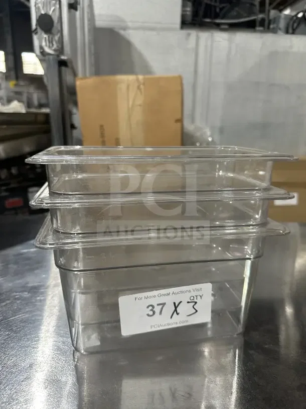 Cambro SP7304 clear polycarbonate 1/4-size food pan set of 3, commercial grade, new condition, label indicates quantity.