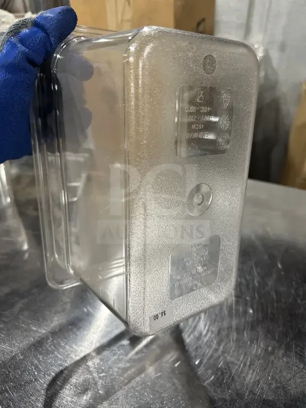 Cambro commercial clear polycarbonate 1/4-size food pan, model SP7304. Durable, clear plastic, stamped measurements, excellent condition.