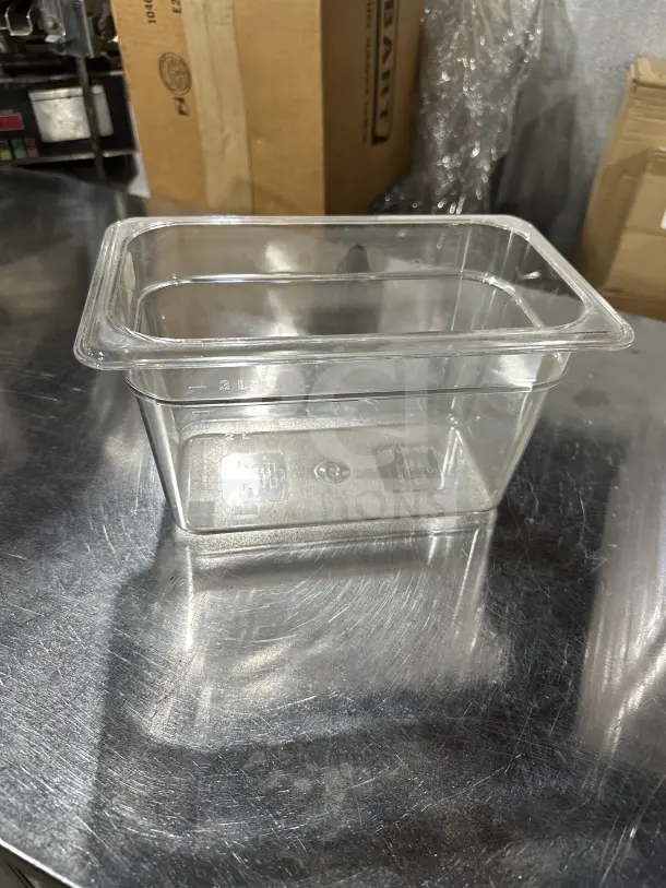 Cambro SP7304 clear polycarbonate 1/4-size food pan. Excellent condition, 3L marked, durable commercial quality.