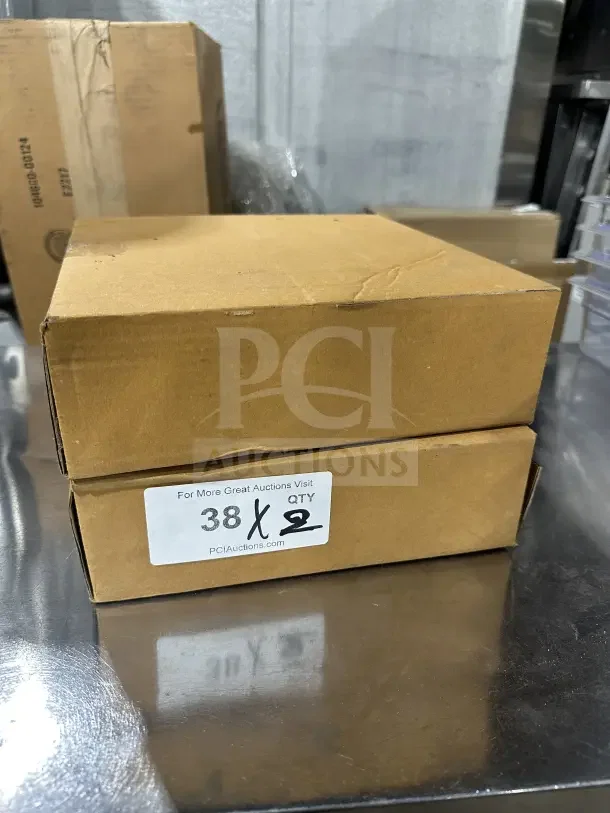 Brown box containing brand new commercial stainless steel flour sieve, fine mesh. Label shows quantity 2, PCI Auctions.