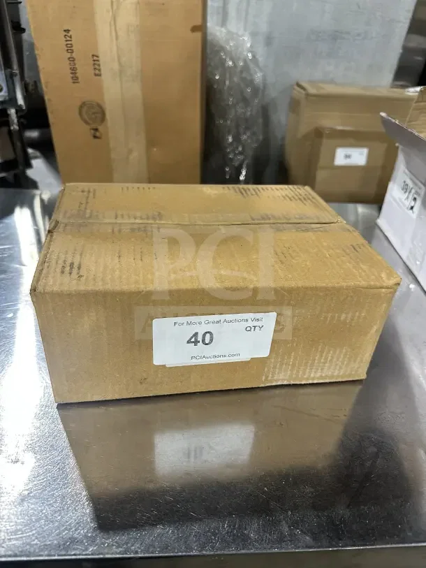 Box of 12 brand new Update International 10 Oz. stainless steel dredge/shakers, model DR-10T, sealed, in pristine condition.