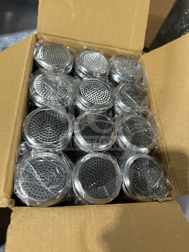 Box of 12 brand new Update International stainless steel 10 oz dredges, model DR-10T, wrapped in plastic.