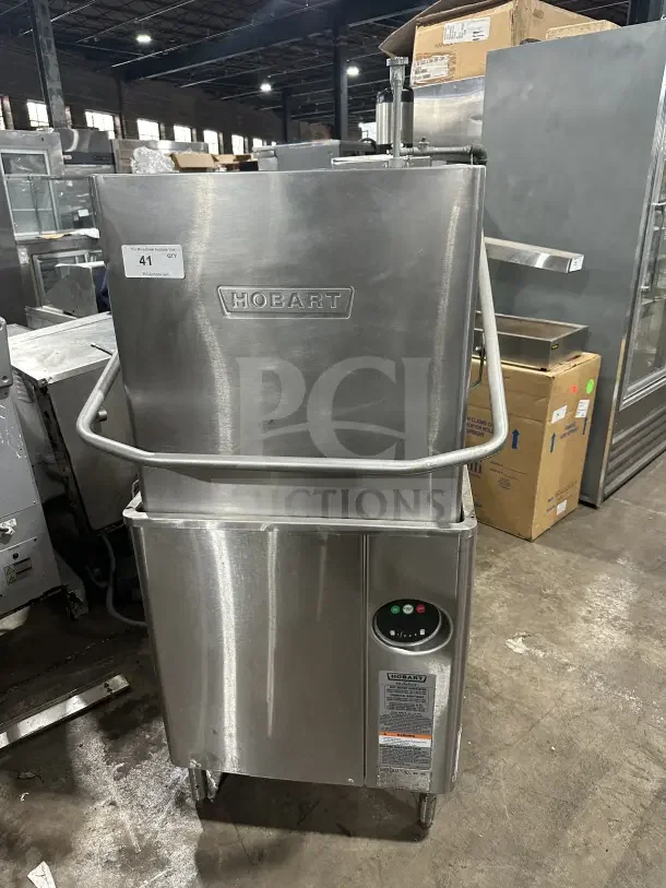Hobart AM15 commercial stainless steel dishwasher, ventless, high-temp, door-type. Model: AM15, 208-240V, 3 phase, on legs.